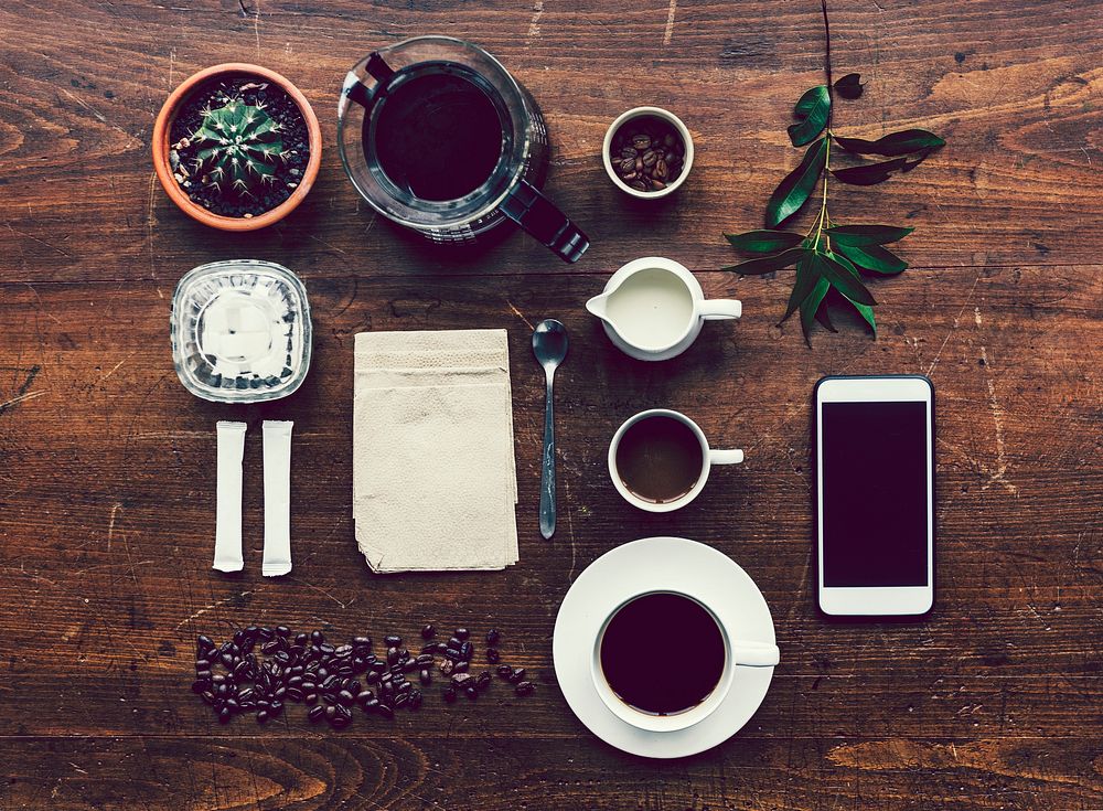 Aerial view of coffee on a wooden table
