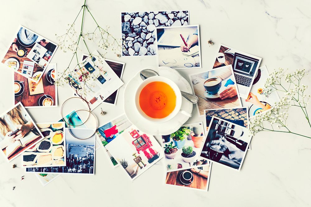 Tea and photographs on a table