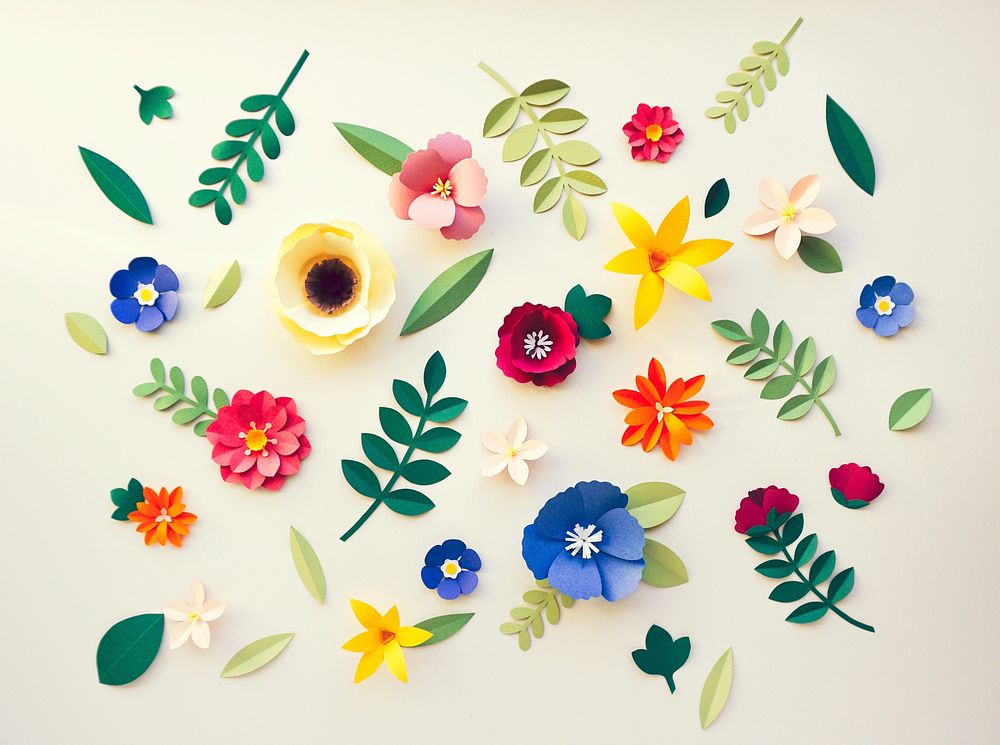 Handmade paper craft flowers on a table