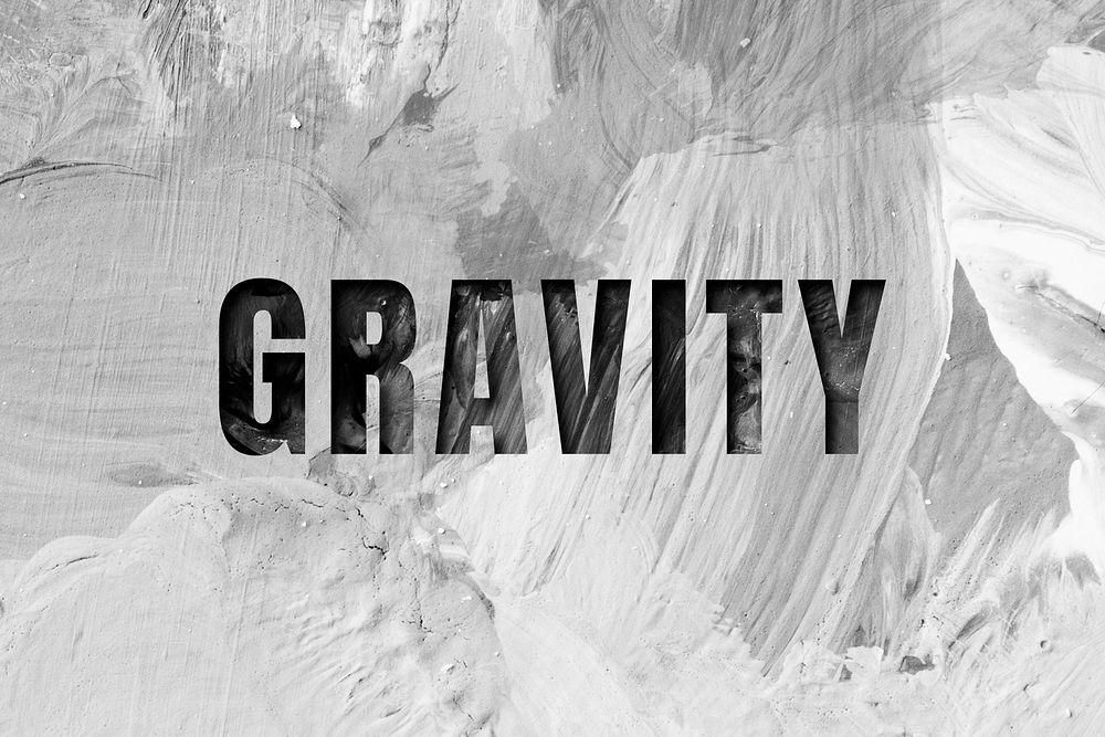 Gravity uppercase letters typography on brush stroke background