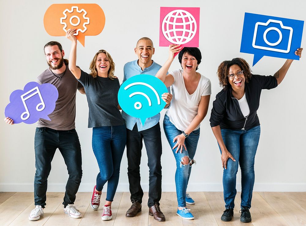 Diverse friends holding social media icons