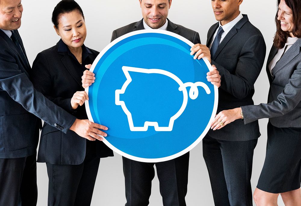 Business people holding a piggy bank icon
