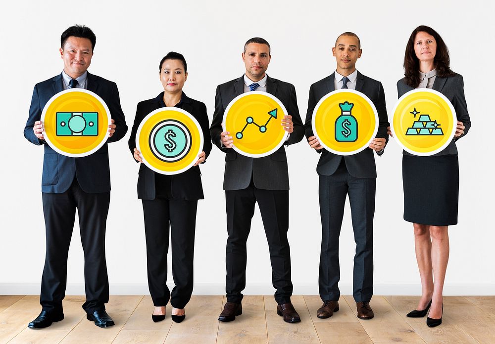 Business people holding financial icons