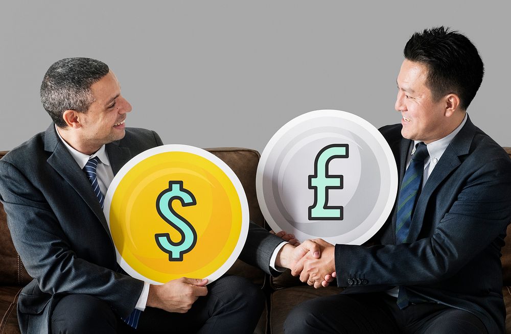 Business people with currency icons