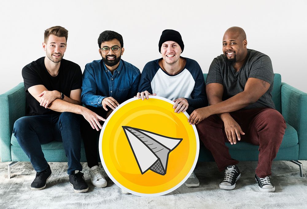 Group of diverse men with a paper plane icon