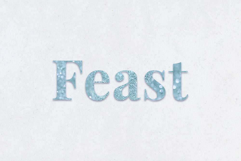Glittery feast light blue font on a blue background