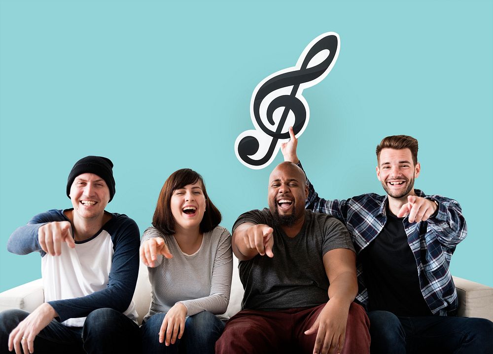 Group of happy friends holding a musical note