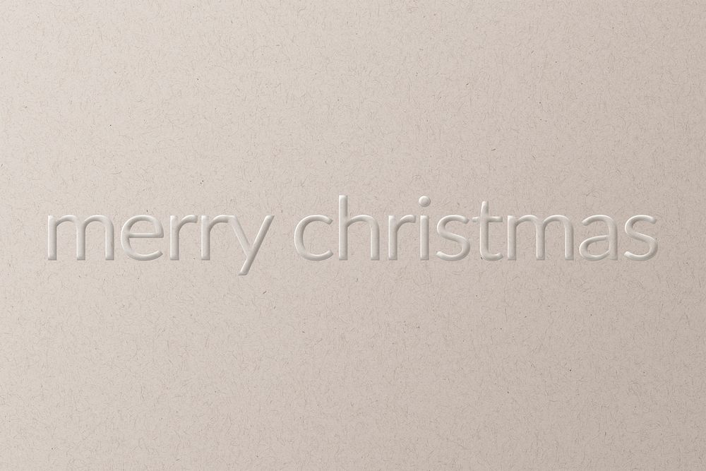 Merry christmas embossed font white paper background