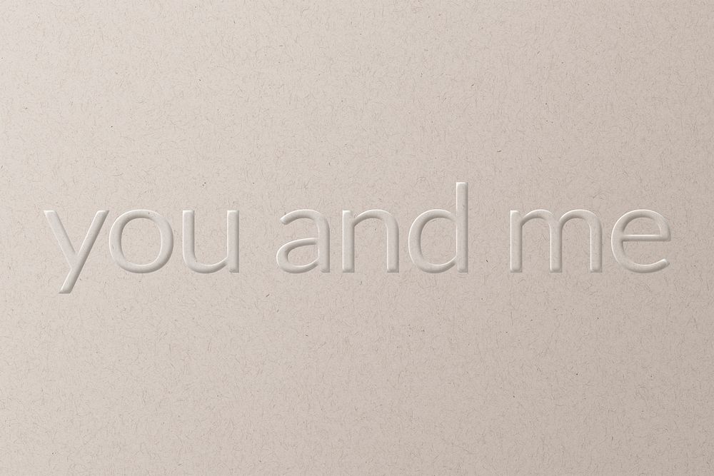 You and me embossed font white paper background