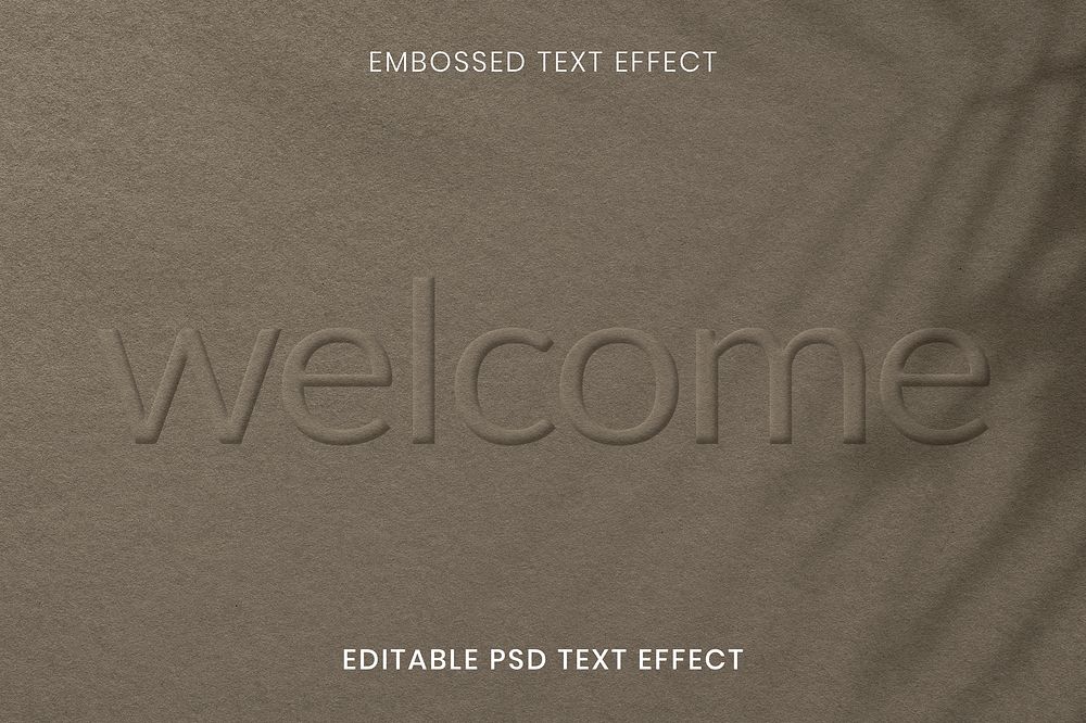 Word embossed editable psd text effect on brown