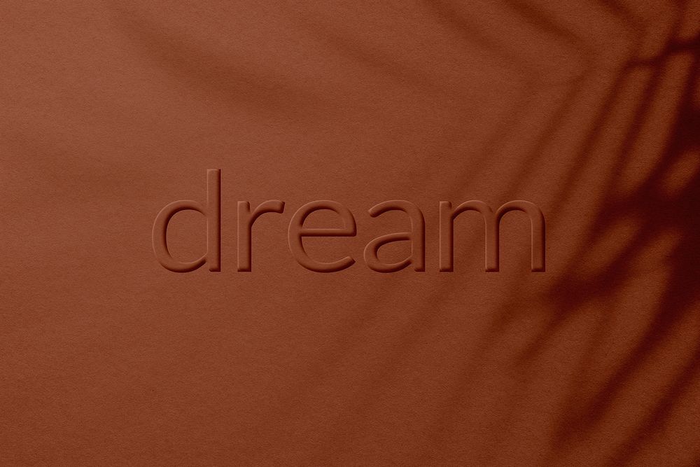 Dream word embossed concrete texture typography