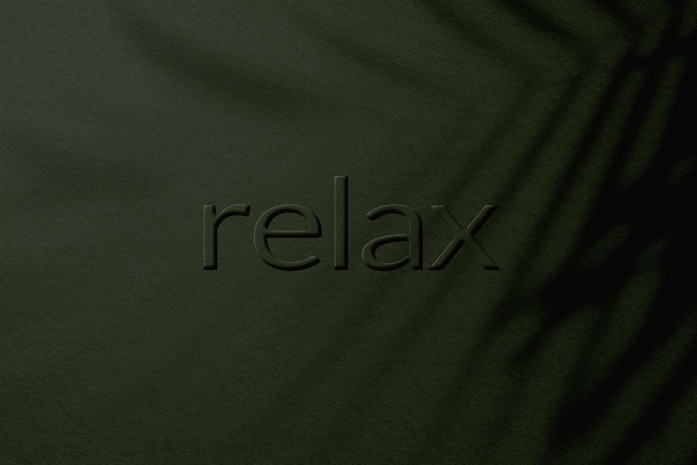 Relax word embossed plant shadow textured font