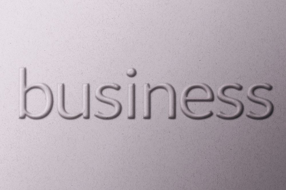 Word business embossed typography on paper texture