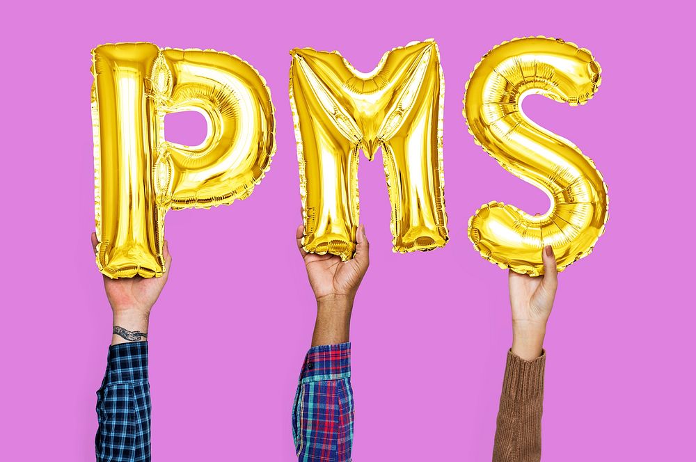 Hands holding PMS word in balloon letters
