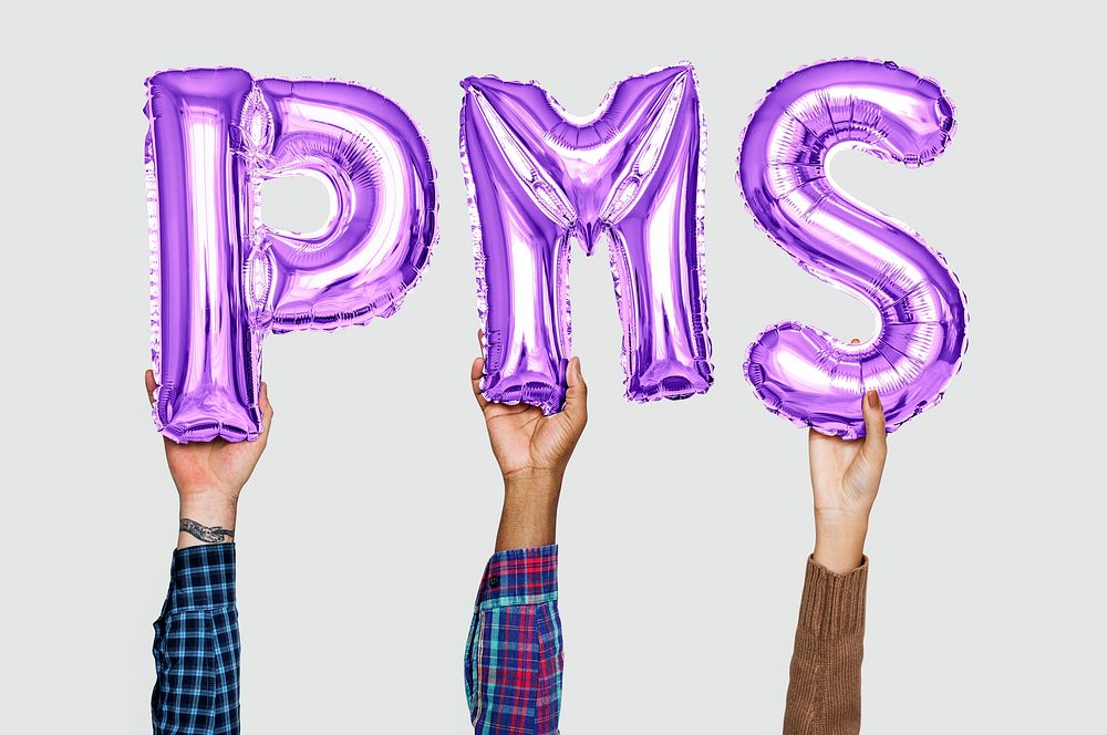 Hands holding PMS word in balloon letters