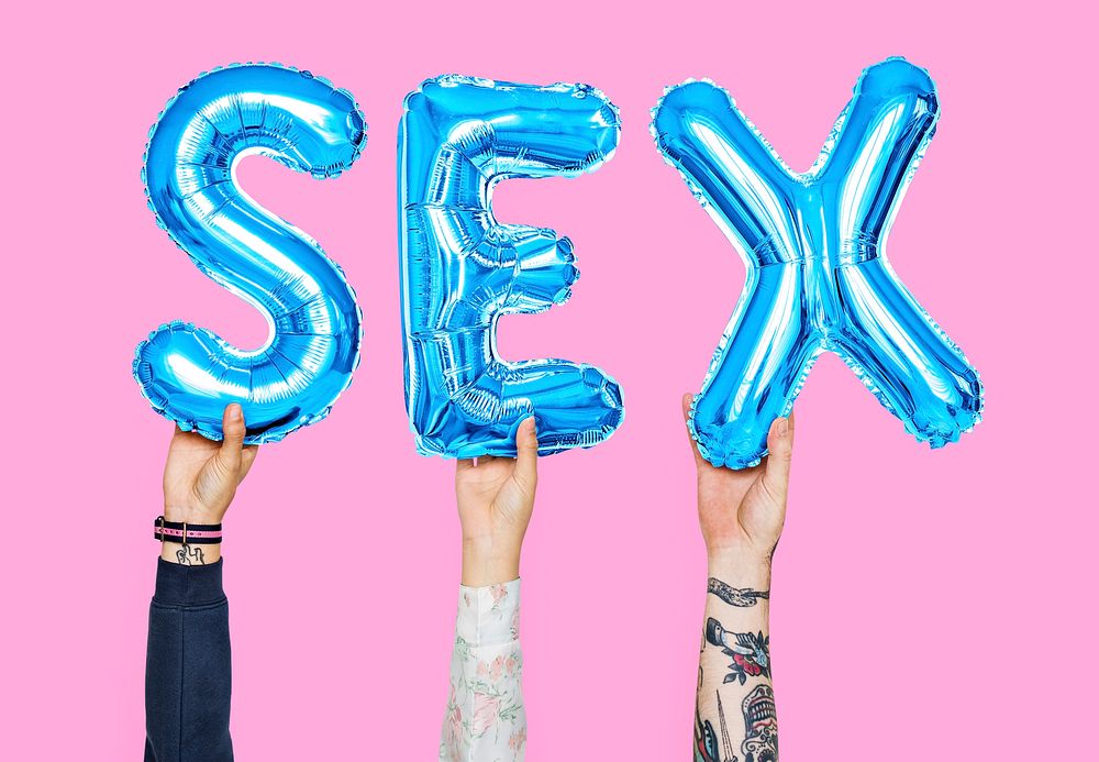 Hands holding sex word in balloon letters