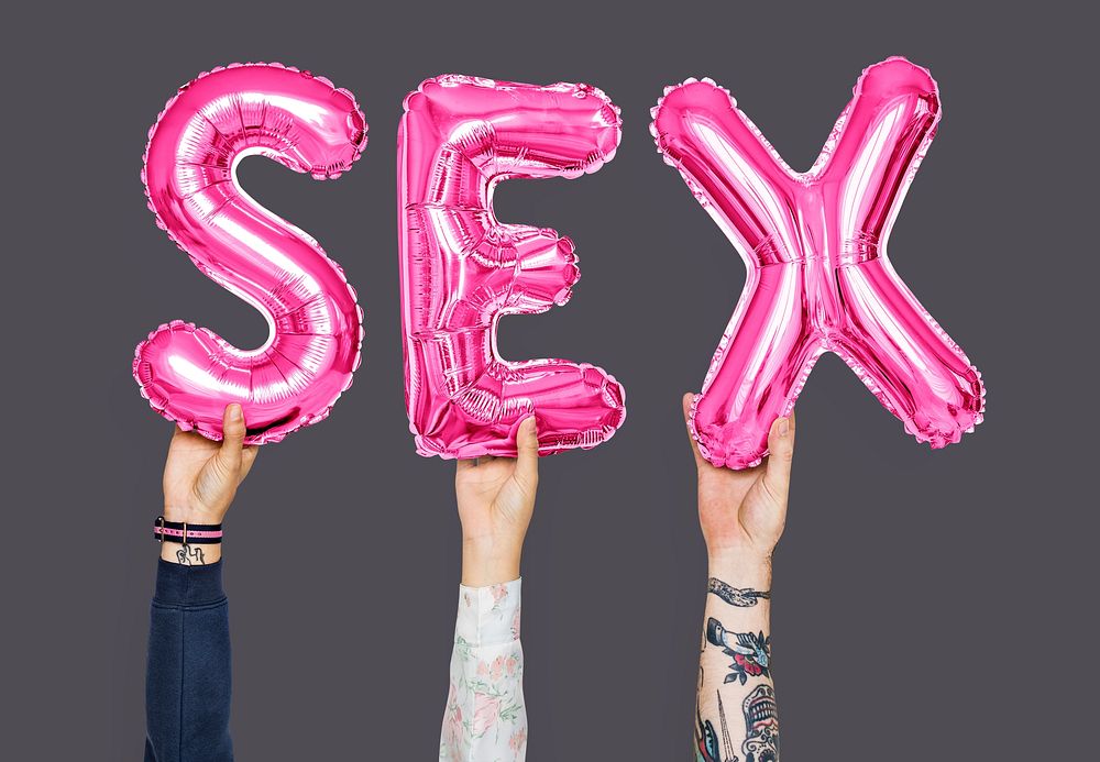 Hands holding sex word in balloon letters