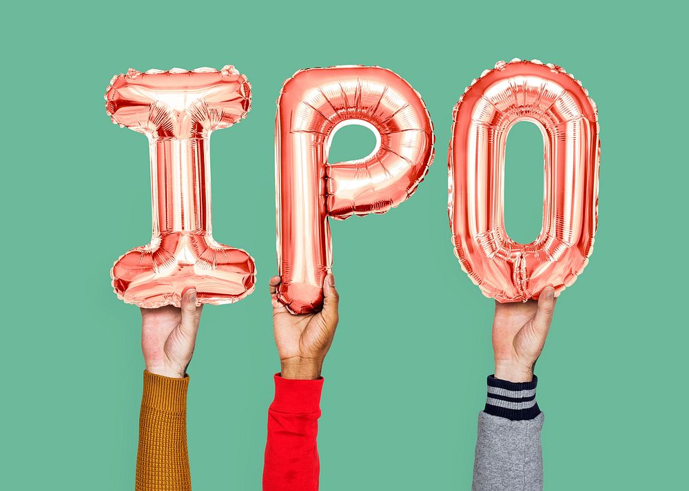 Hands holding IPO word in balloon letters