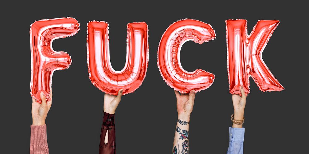 Hands holding fuck word in balloon letters