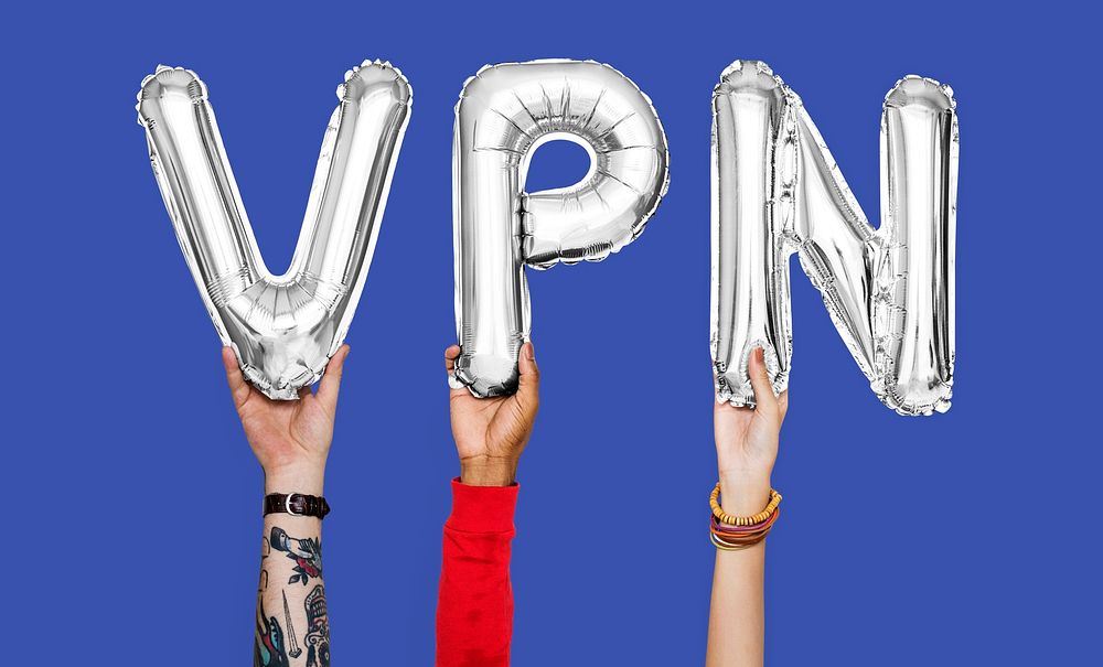 Hands holding VPN word in balloon letters