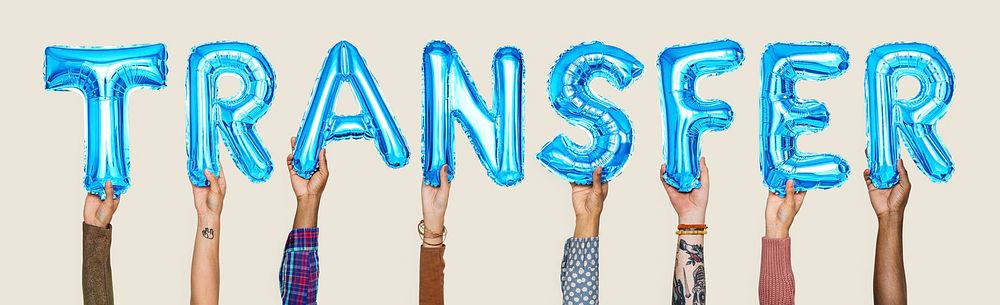 Hands holding transfer word in balloon letters