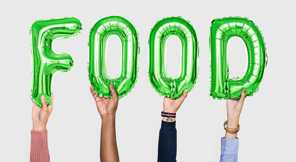 Hands holding food word in balloon letters
