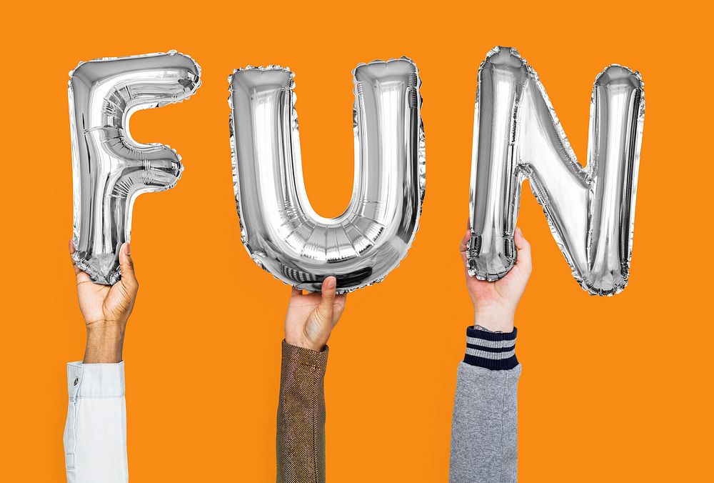 Silver gray alphabet balloons forming the word fun