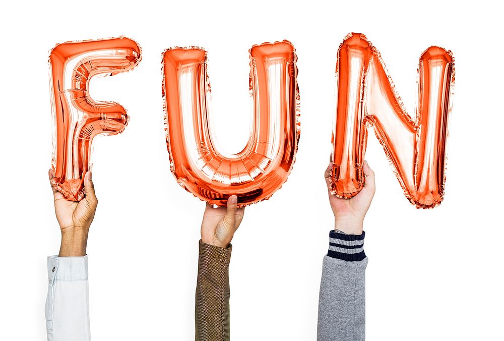 Orange alphabet balloons forming the word fun