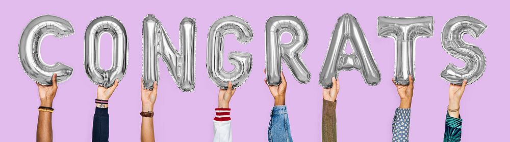 Silver gray alphabet balloons forming the word congrats
