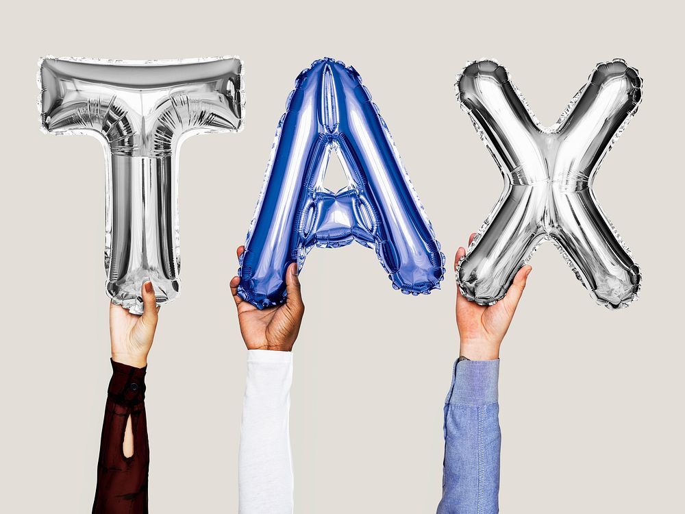 Hands showing tax balloons word