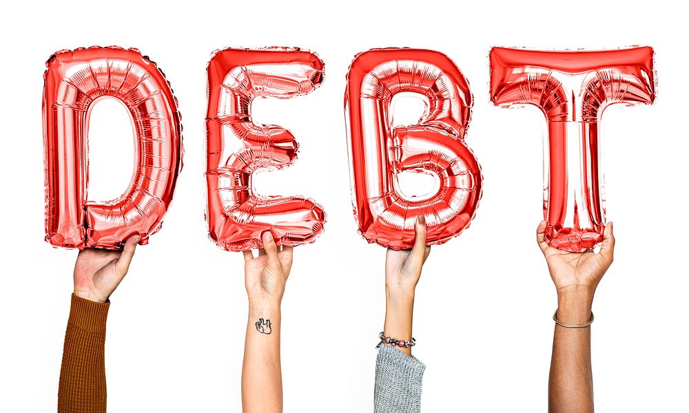 Red balloon letters forming the word debt