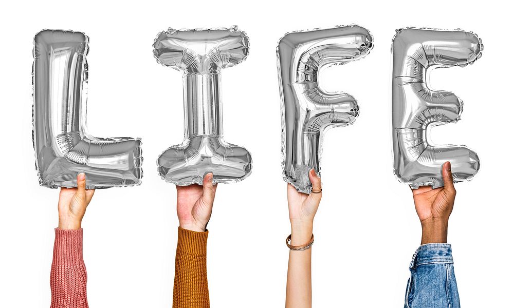 Hands showing life balloons word