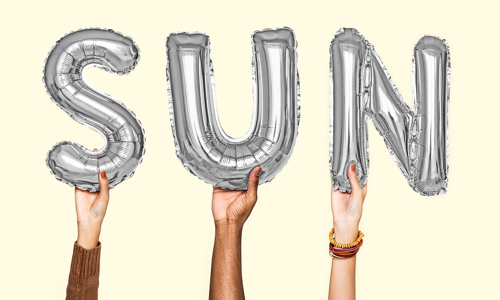 Hands showing sun balloons word