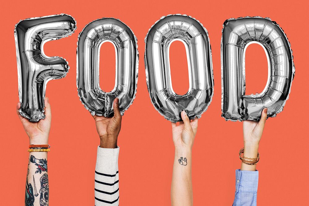 Hands showing food balloons word