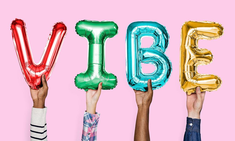 Colorful alphabet balloons forming the word vibe