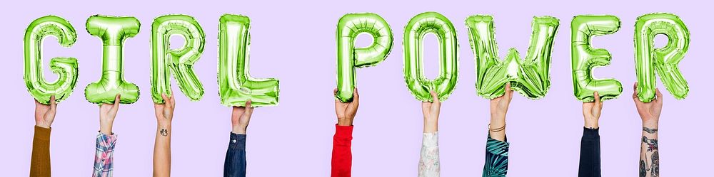 Hands holding girl power word in balloon letters