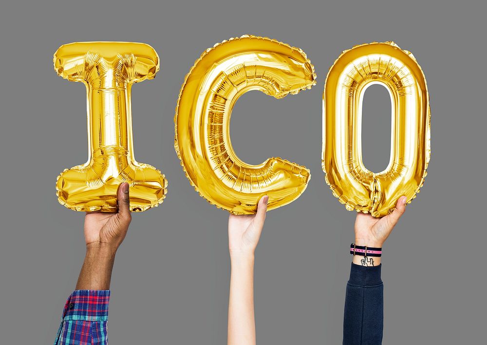 Hands holding ICO word in balloon letters