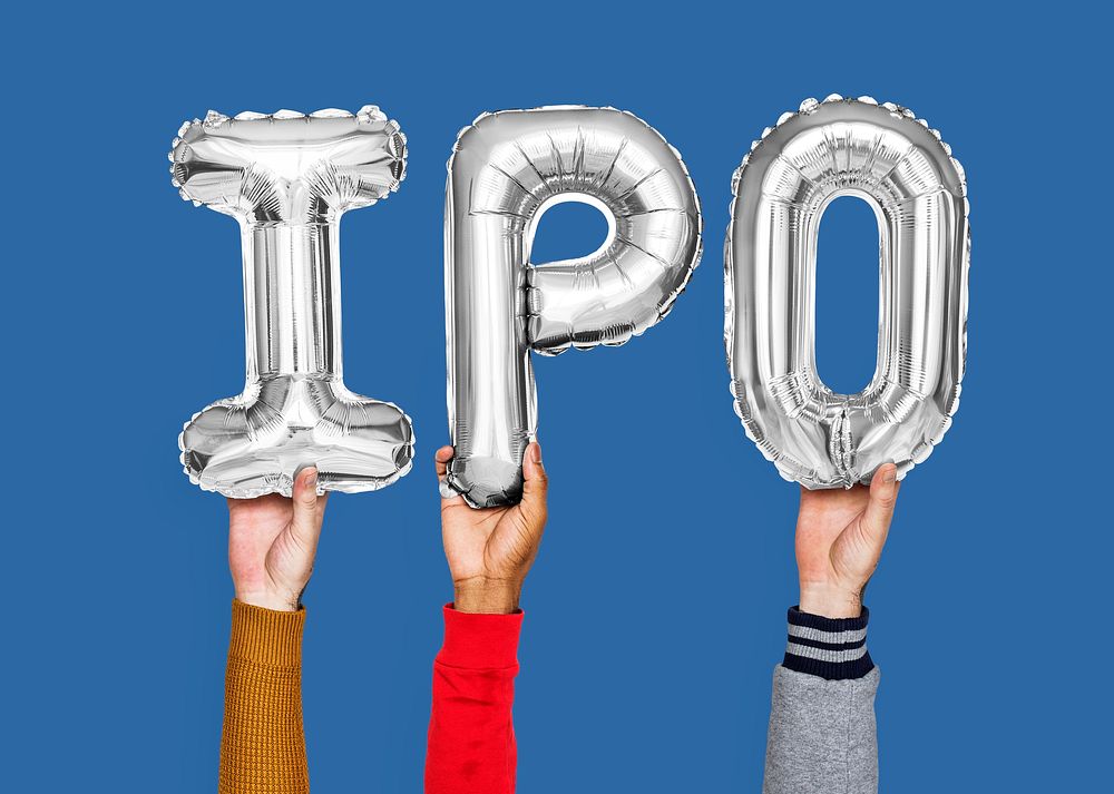 Hands holding IPO word in balloon letters