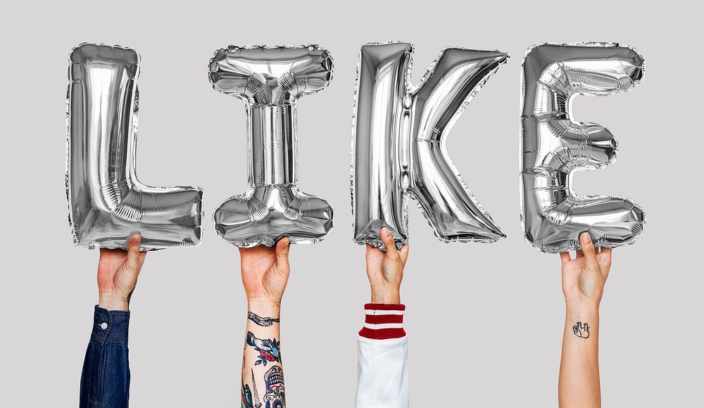 Gray silver alphabet helium balloons forming the text like