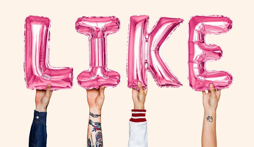 Pink alphabet helium balloons forming the text like
