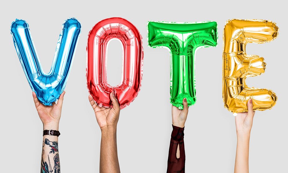 Colorful alphabet balloons forming the word vote