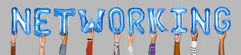 Hands holding networking word in balloon letters