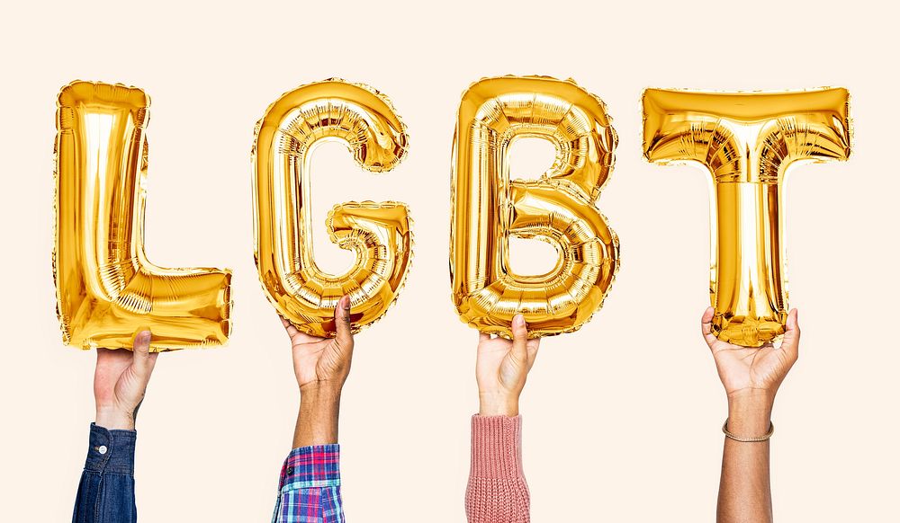 Yellow gold alphabet balloons forming the word LGBT
