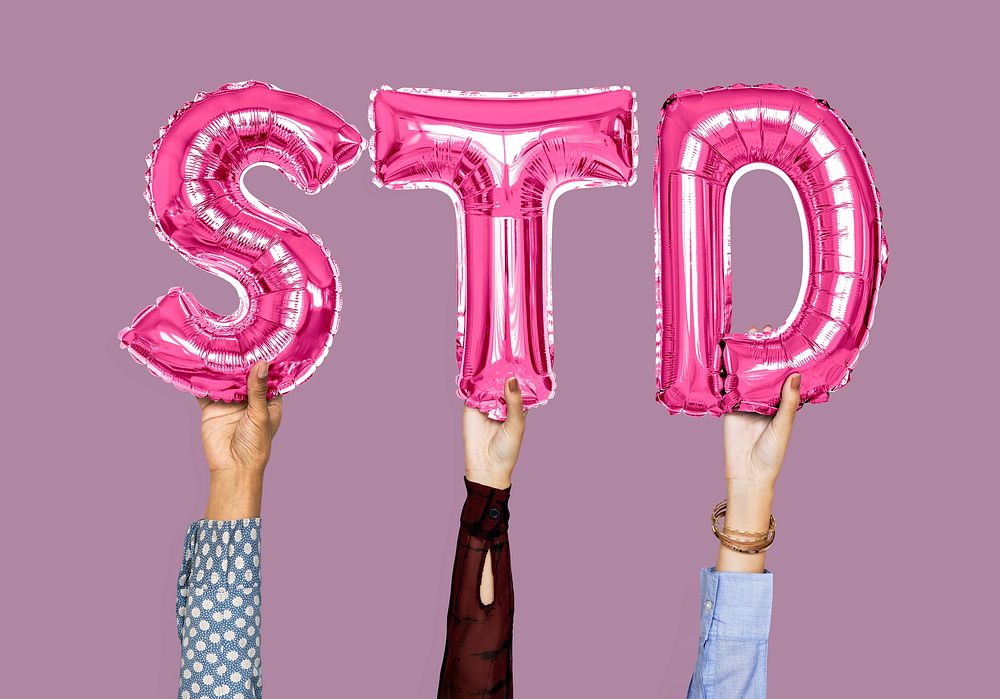Hands holding STD word in balloon letters