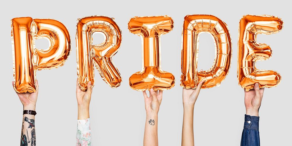 Orange alphabet balloons forming the word pride