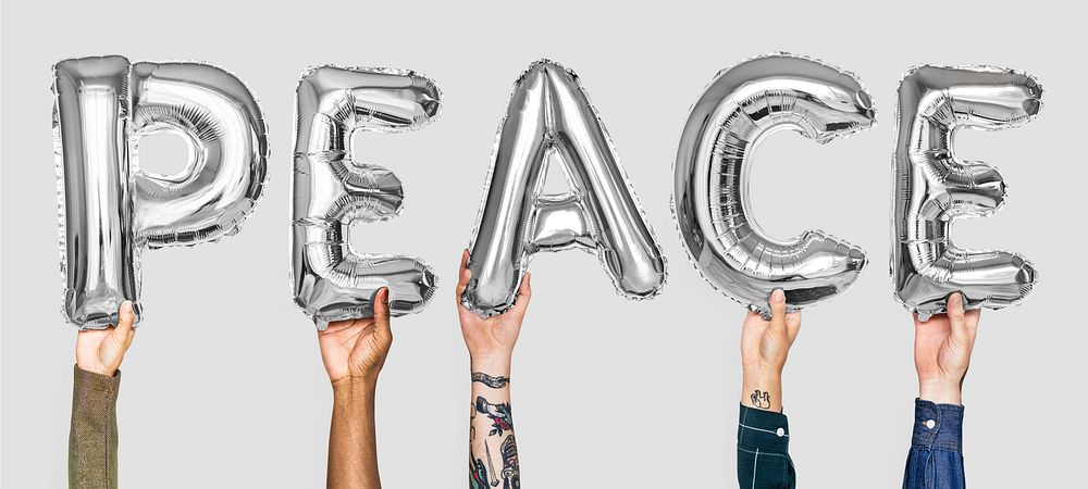 Silver gray alphabet balloons forming the word peace