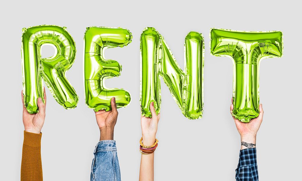 Green alphabet balloons forming the word rent
