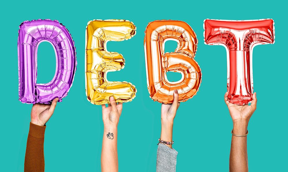 Colorful balloon letters forming the word debt