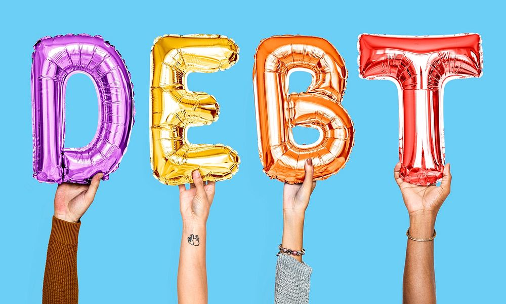 Colorful balloon letters forming the word debt