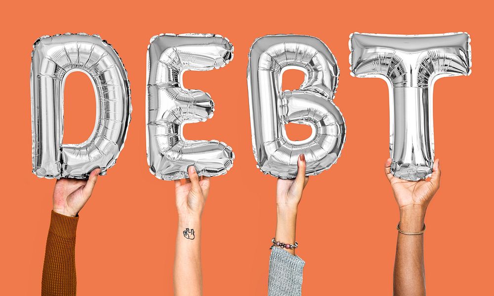 Gray balloon letters forming the word debt